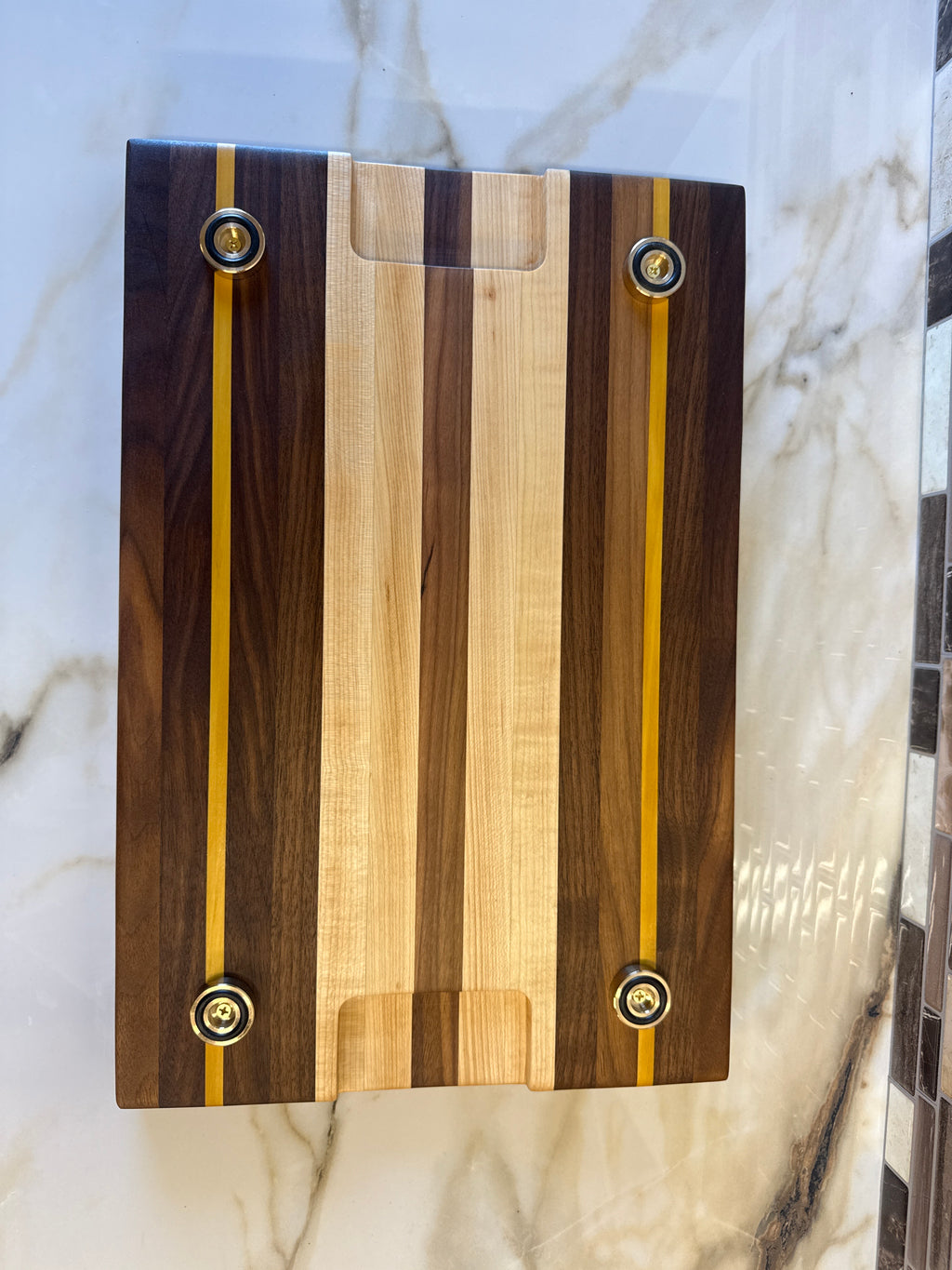 Heritage Cutting Board 18” × 12” × 1.5” — Maple, Walnut, & Yellow Heart | Juice Groove + Hand Holds with brass feet