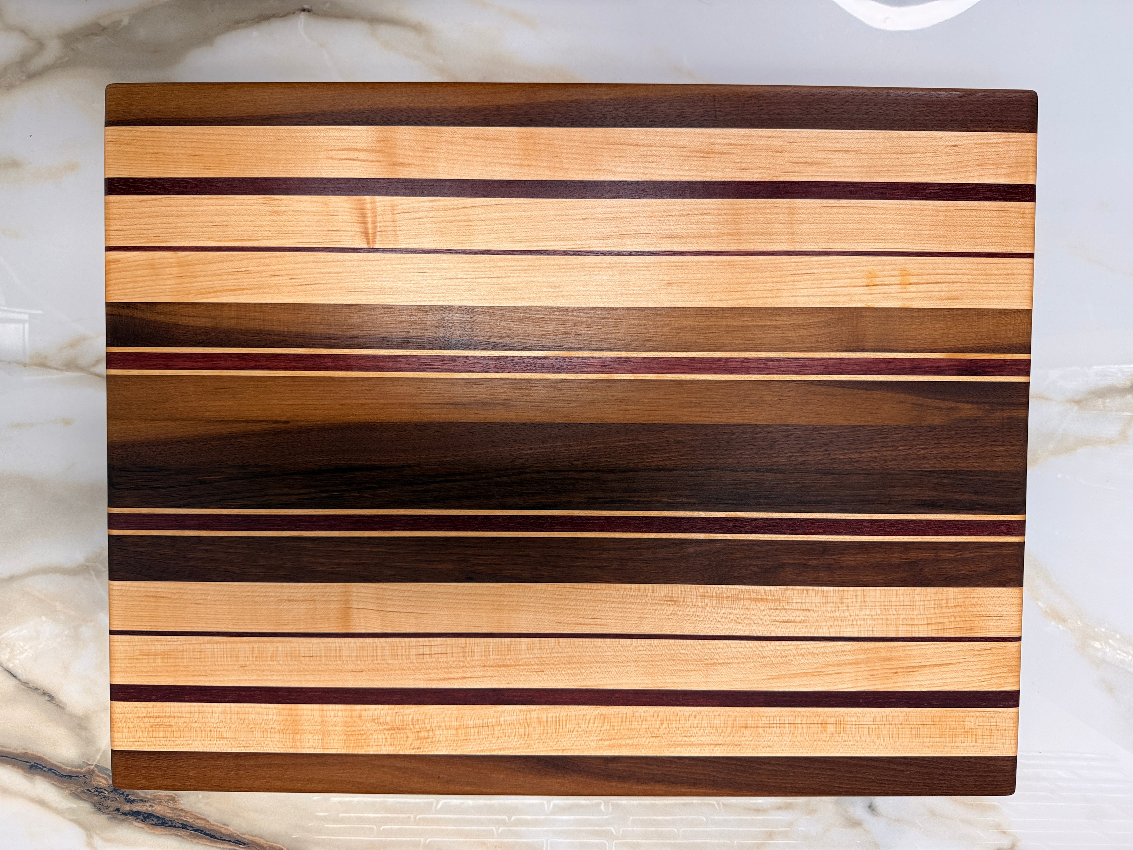 Heirloom Elite Cutting Board — Edge Grain Walnut, Maple & Purpleheart (16” × 22”)