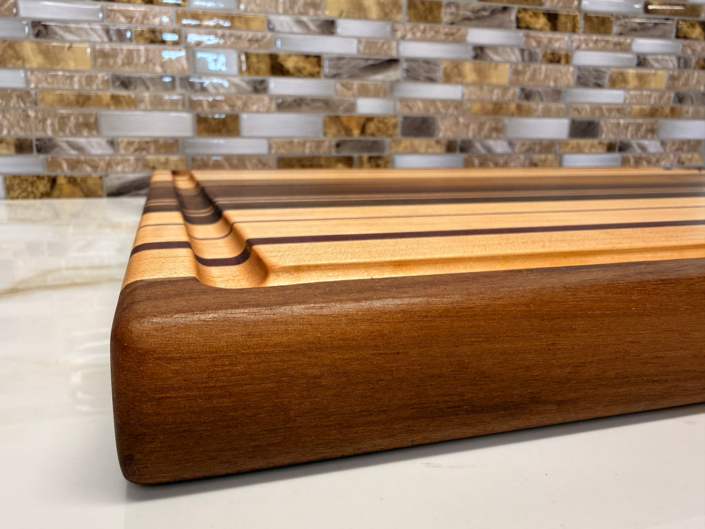 Heirloom Elite Cutting Board — Edge Grain Walnut, Maple & Purpleheart (16” × 22”)