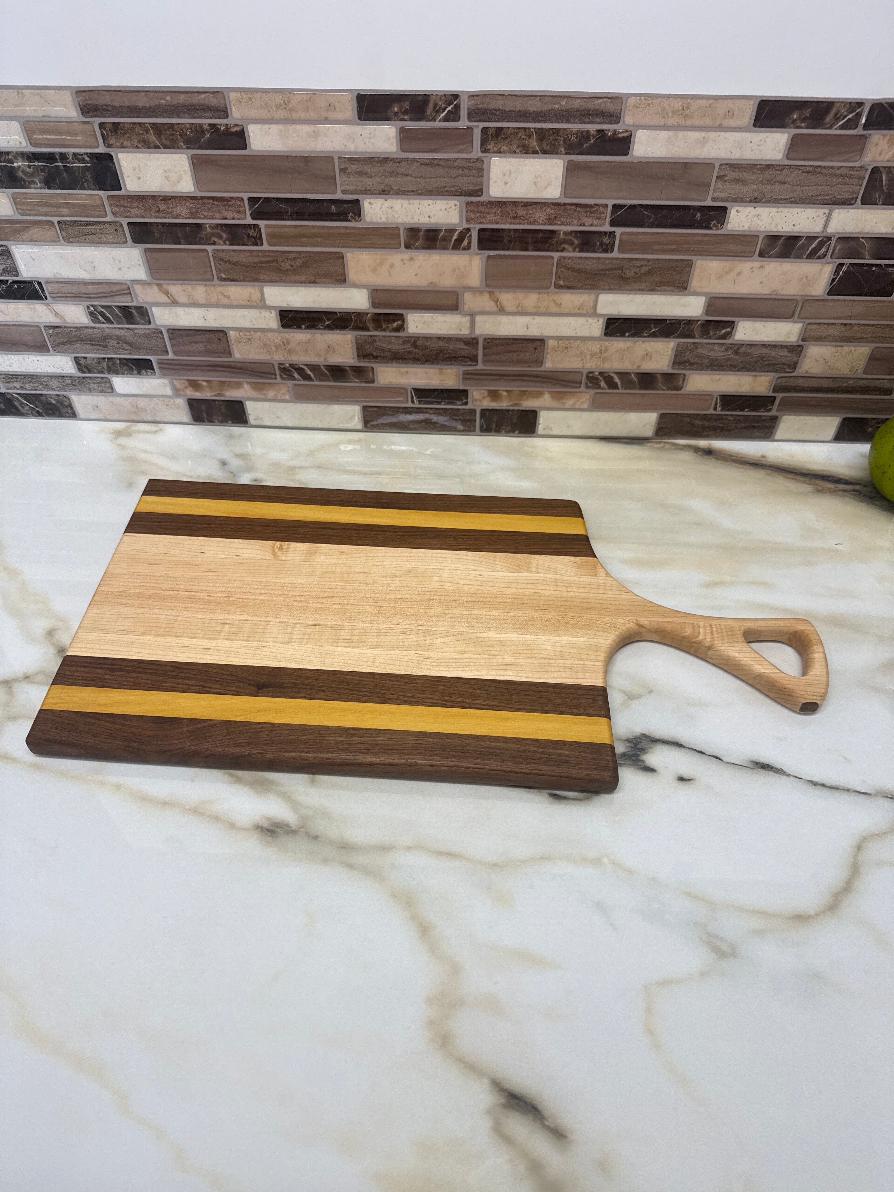 Heritage Hosting Board walnut, Yellow Heart, and maple