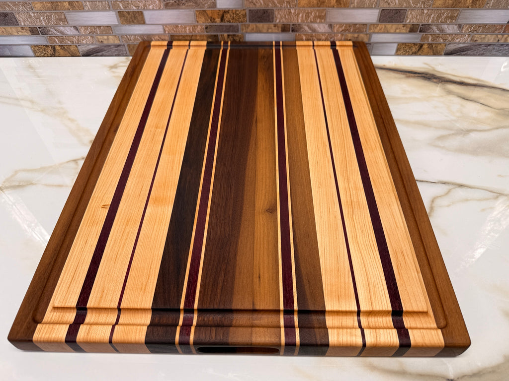 Heirloom Elite Cutting Board — Edge Grain Walnut, Maple & Purpleheart (16” × 22”)