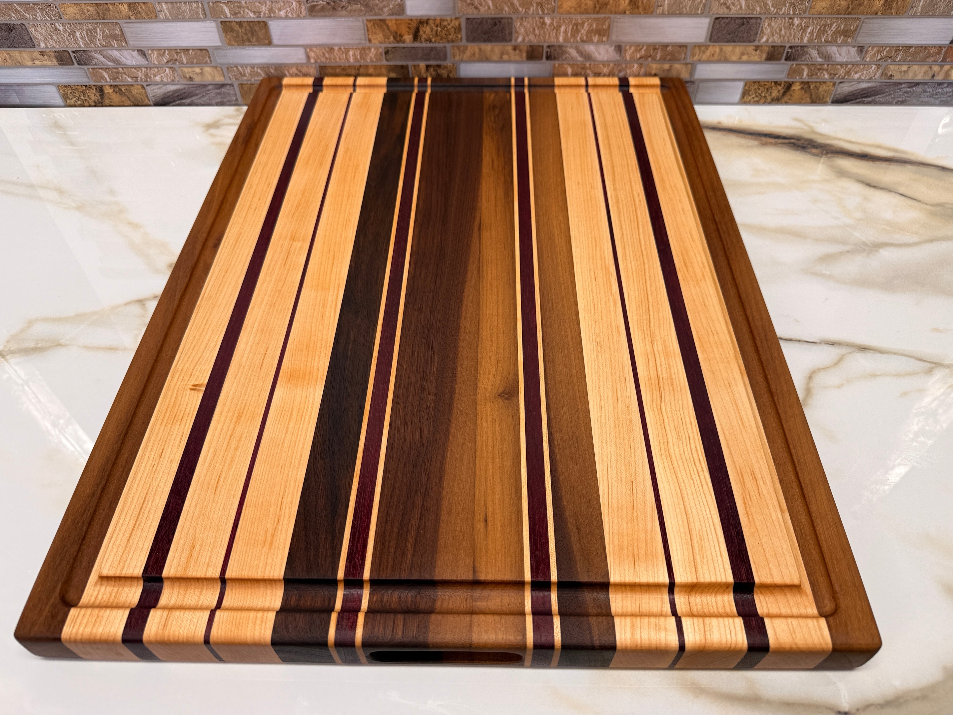 Heirloom Elite Cutting Board — Edge Grain Walnut, Maple & Purpleheart (16” × 22”)