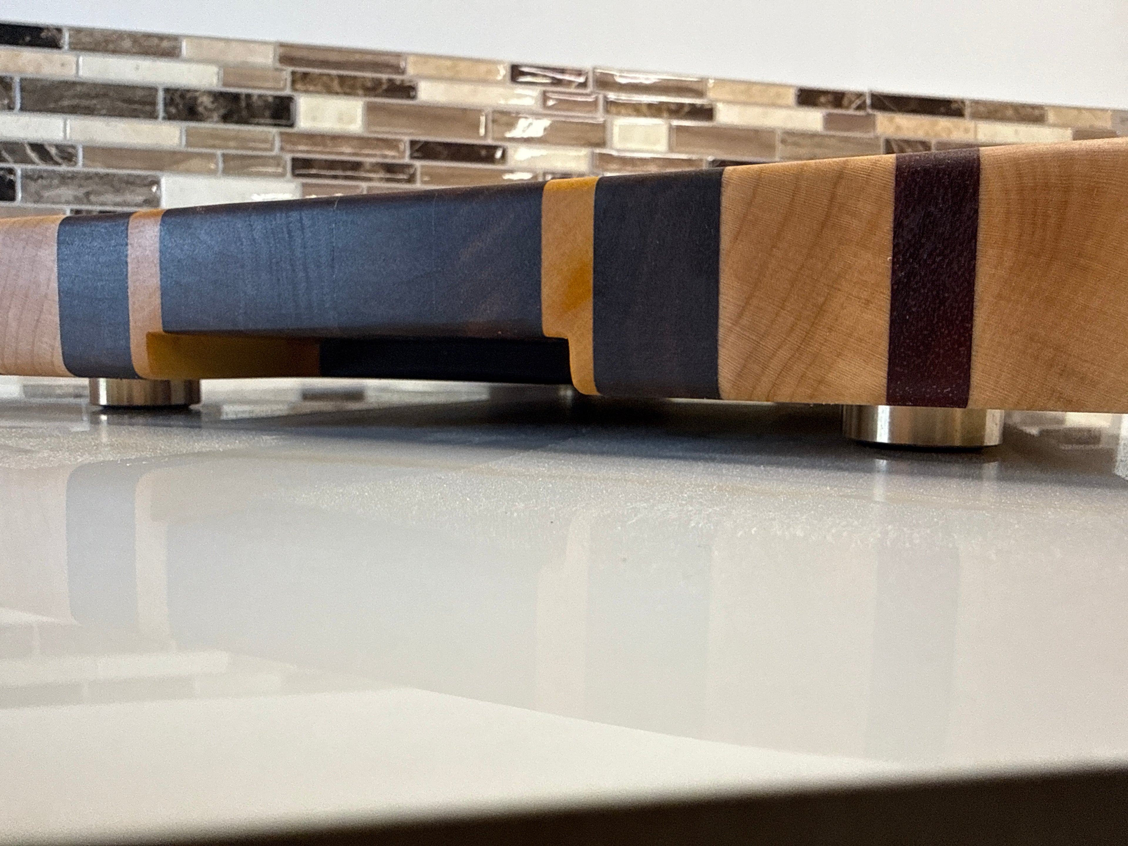 Heritage Cutting Board 18” × 12” × 1.5” — Maple, Walnut, Yellow Heart and Padauk.
